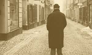 b anziano spalle strada pave
