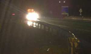 lavori superstrada notte pioggia luci