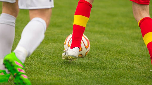 calcio palla gambe