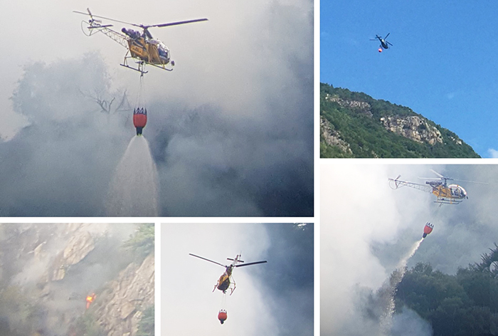 Ancora lanci d'acqua con l'elicottero sul fronte colpito da un incendio sopra Crevola
